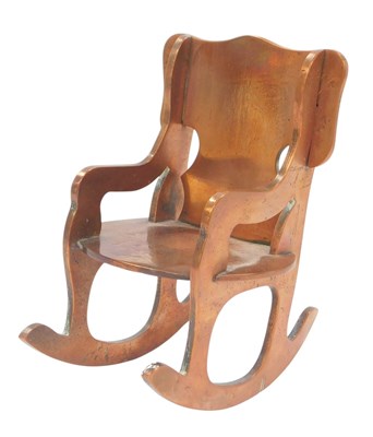 Lot 346 - A copper model of a rocking chair, 13cm high.