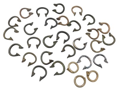 Lot 368 - A group of mixed metal Manilla bracelets.