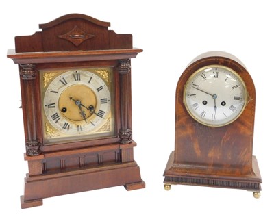 Lot 380 - An Edwardian mahogany and inlaid mantel clock,...