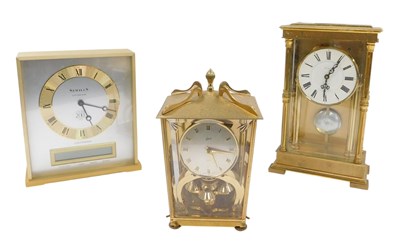 Lot 385 - Three brass cased mantel clocks, by Rapport,...