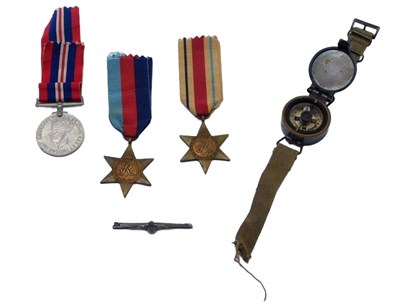 Lot 404 - A group of World War II medals, comprising the...