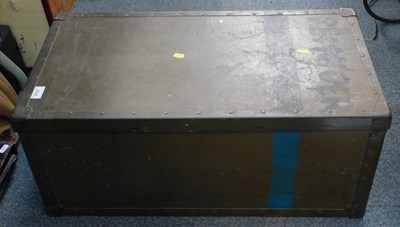Lot 2122 - A large metal trunk with carrying handles.