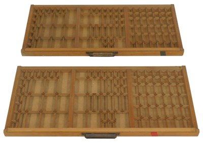 Lot 422 - Two printer drawers, each with varying-sized...
