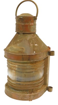 Lot 415 - A copper and brass ship's signal lamp, bearing...