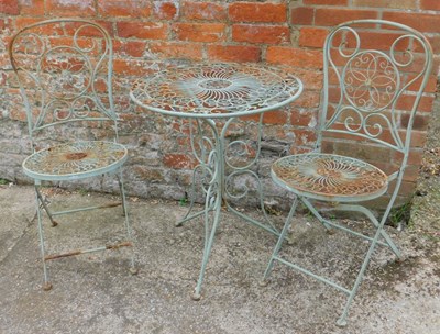 Lot 481 - A green painted metal garden bistro...