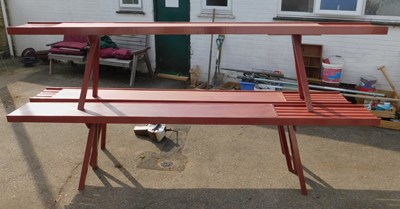 Lot 482 - Three red painted potting tables, each with a...