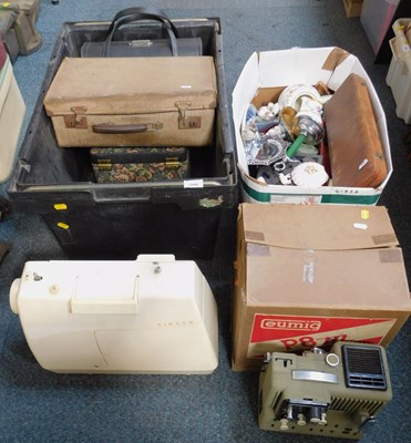 Lot 2096 - Luggage, a sewing machine, carving set,...