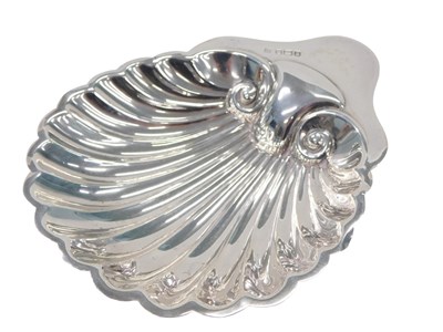 Lot 99 - An Edward VII silver shell shaped dish, on...