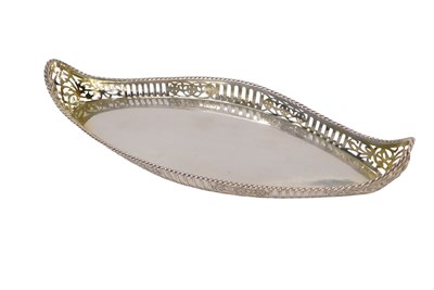 Lot 100 - A Victorian silver boat shaped tray, with a...