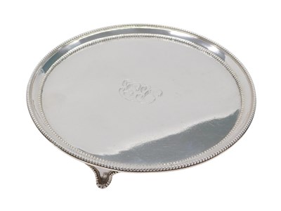Lot 104 - A George IV silver circular salver, with...