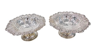 Lot 107 - A pair Edward VII of silver pedestal...
