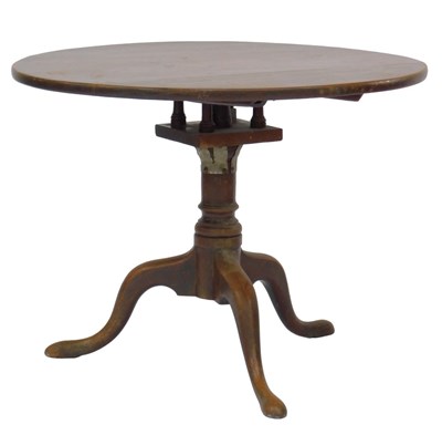 Lot 523 - A Georgian oak tilt top table, the circular...