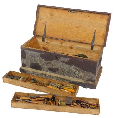 Lot 529 - A stained pine tool chest, the hinged lid...