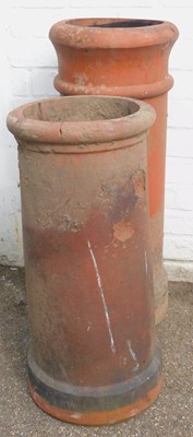 Lot 478 - Two terracotta chimney pots, 74cm high and...