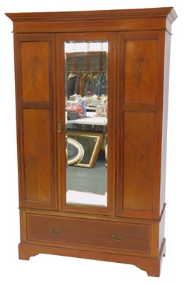 Lot 555 - An Edwardian mahogany and inlaid wardrobe, the...
