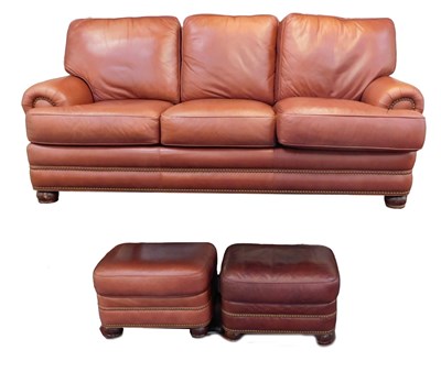 Lot 556 - A Hancock and Moore three seater chestnut...