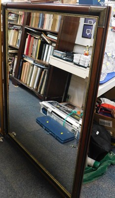 Lot 2141 - A large rectangular bevelled mirror in a...