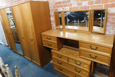 Lot 1104 - A G-Plan bedroom suite, comprising triple...