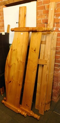 Lot 1105 - A pine double bed frame, with head and...