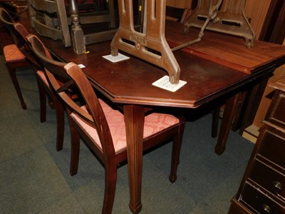 Lot 1066 - A mahogany dining table, and six chairs. The...