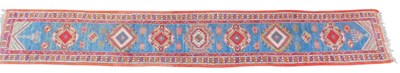 Lot 607 - An Heriz runner, blue ground decorated with...