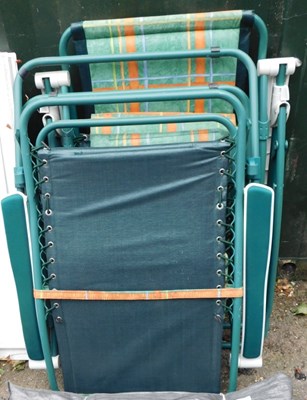 Lot 1123 - Two folding reclining garden chairs and a...