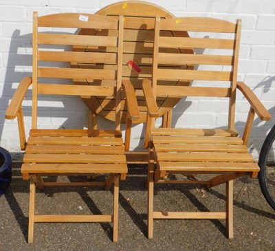 Lot 1131 - A garden set, comprising two folding chairs...