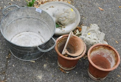 Lot 1134 - Two terracotta plant pots, a composition stone...
