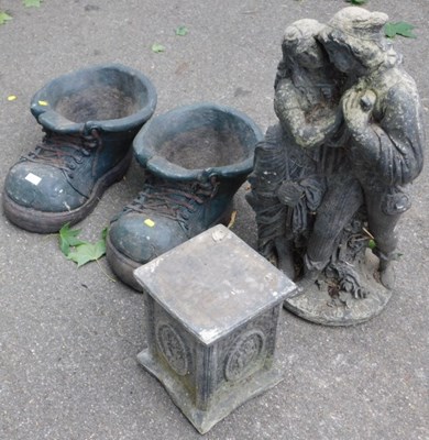 Lot 1139 - Garden ornaments, including two novelty boot...