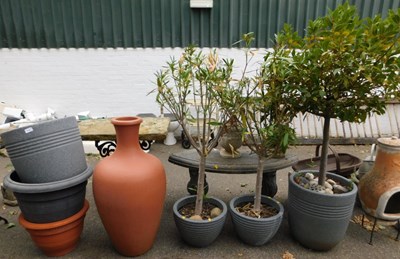 Lot 1142 - Various plastic garden plant pots, some with...