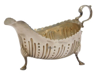 Lot 599A - A Continental sauce boat, with dimpled spiral...