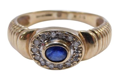 Lot 143 - A 9ct gold dress ring, the central oval panel...