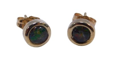 Lot 220 - A pair of 9ct gold stud earrings, set with...