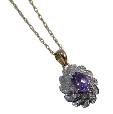 Lot 222 - A 9ct gold pendant and chain, the 9ct white...