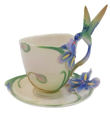 Lot 285 - A Kaiser porcelain tea cup and saucer, the...