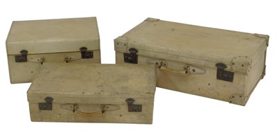 Lot 465 - Three Vellum animal skin suitcases, 76cm wide,...