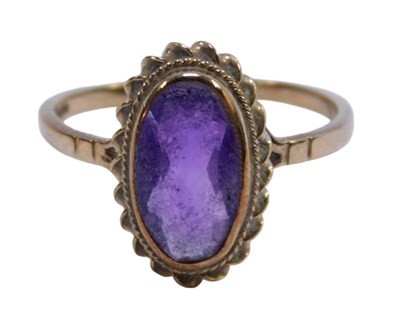 Lot 569 - A 9ct gold amethyst dress ring, the oval...