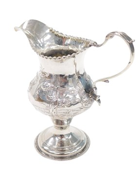 Lot 143 - A George IV silver cream jug, with beaded rim,...