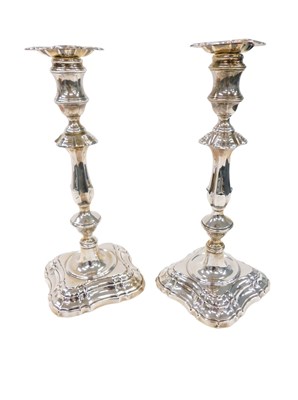 Lot 150 - A pair of Edward VII silver candlesticks, of...