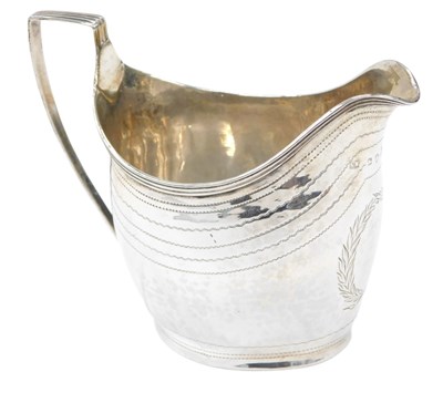 Lot 154 - A George III silver pedestal milk jug, with...