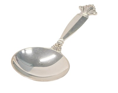 Lot 161 - A Georg Jensen silver caddy spoon, with fleur...