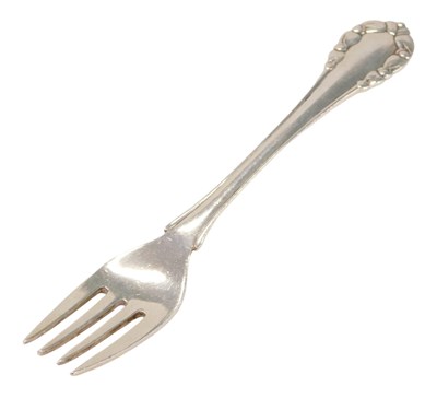 Lot 175 - A Georg Jensen silver fork, with arched tulip...