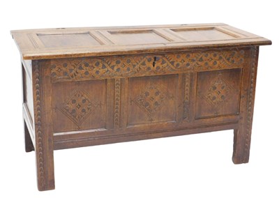 Lot 4 - A 17thC oak coffer, with three panel top,...