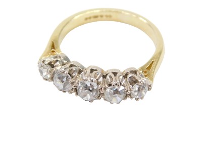 Lot 13 - An 18ct gold five stone diamond dress ring,...