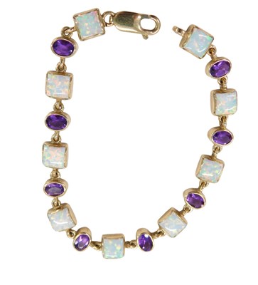 Lot 299 - A 9ct gold opal and amethyst bracelet, set...