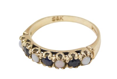 Lot 227 - A 9ct gold half hoop dress ring, with four...