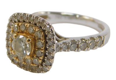 Lot 144A - An 18ct white gold and diamond cluster ring,...