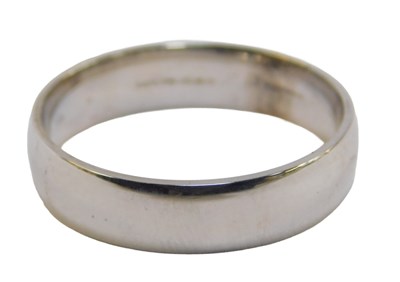 Lot 145a - A 9ct white gold wedding band, size Q, 4.1g.