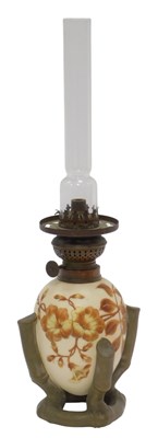 Lot 358a - A ceramic oil lamp base, of egg form decorated...