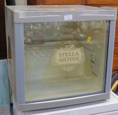 Lot 1145 - A Stella Artois table or counter top...